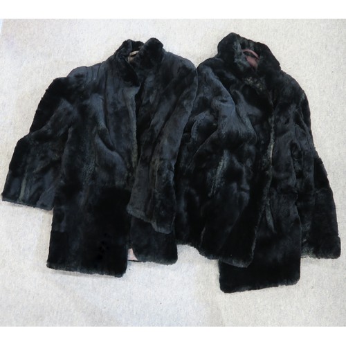 157 - Two black fur jackets