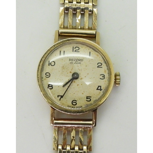 773 - A 9ct gold ladies record De Luxe watch and strap, length 18.5cm, diameter approx 2cm, weight includi... 