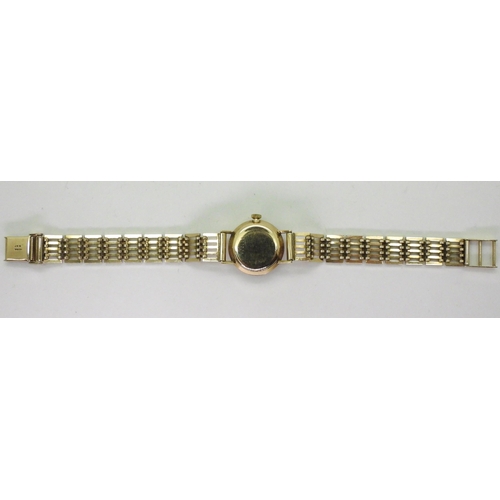 773 - A 9ct gold ladies record De Luxe watch and strap, length 18.5cm, diameter approx 2cm, weight includi... 