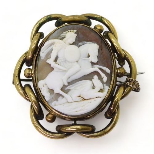 784 - A cameo of George & the Dragon in a Pinchbeck locket back brooch mount