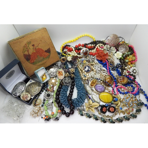 830 - A large collection of costume jewellery to include a string of Cherry amber coloured beads, (weight ... 