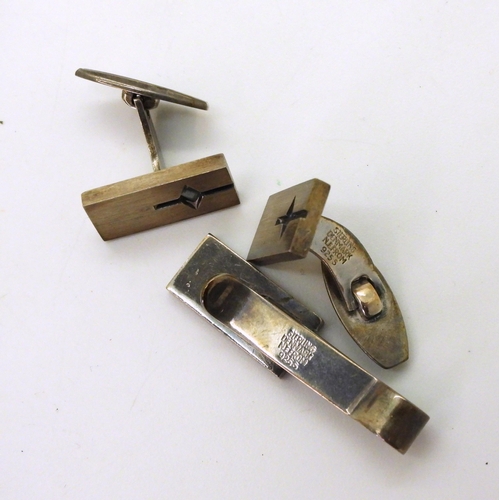 841 - A Danish silver tie slide and cufflinks set by N.E.From, an Ortak silver brooch and earring set enam... 