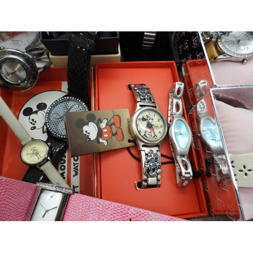 846 - A large collection of ladies fashion watches, to include, a Danbury Mint Titanic Centenary silver in... 