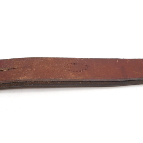 515 - A Lochgelly school tawse by Robert Philp & Son 