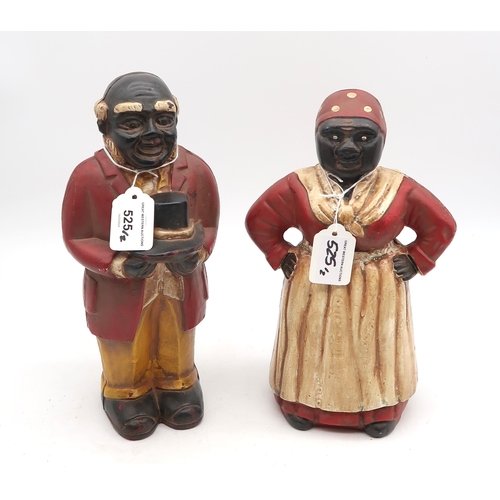 525 - A pair of cast iron figural money banks, the gentleman measuring approx. 28cm in height