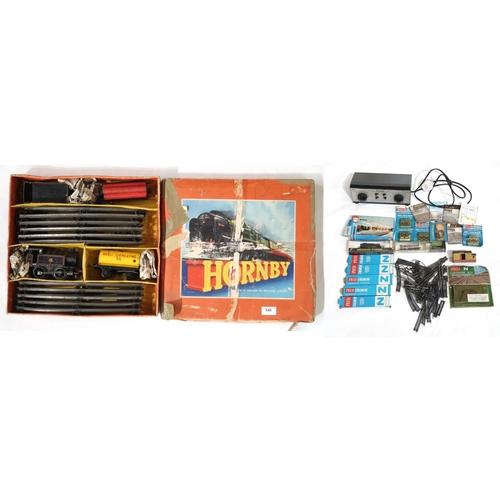 548 - A boxed Hornby 0-gauge clockwork train set, together with a small assortment of N-gauge model railwa... 