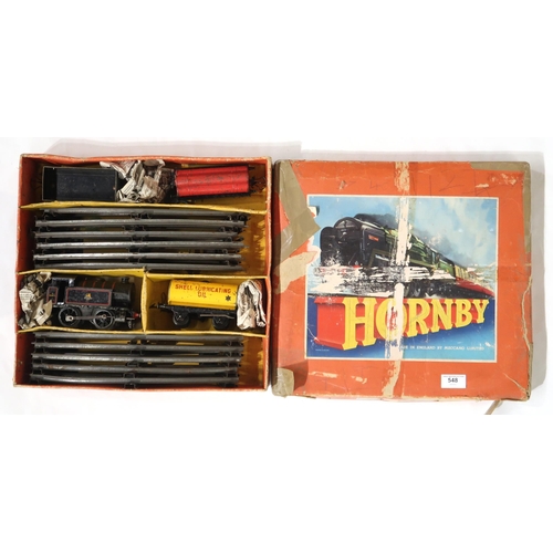 548 - A boxed Hornby 0-gauge clockwork train set, together with a small assortment of N-gauge model railwa... 