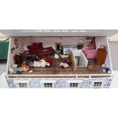 552 - A large contemporary dolls' house, modelled as Alex Rennie's Poulterers, with contents, the structur... 