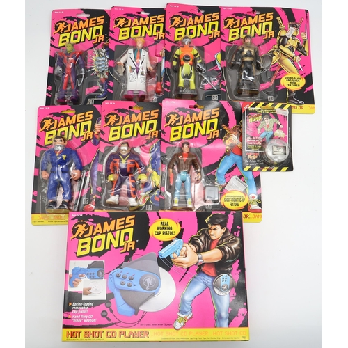 562 - A collection of James Bond Jr action figures, in card-backed packaging (some opened)