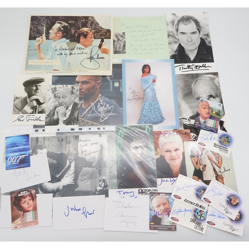 564 - JAMES BONDA collection of signed photographs of James Bond actors and associated figures, to include... 