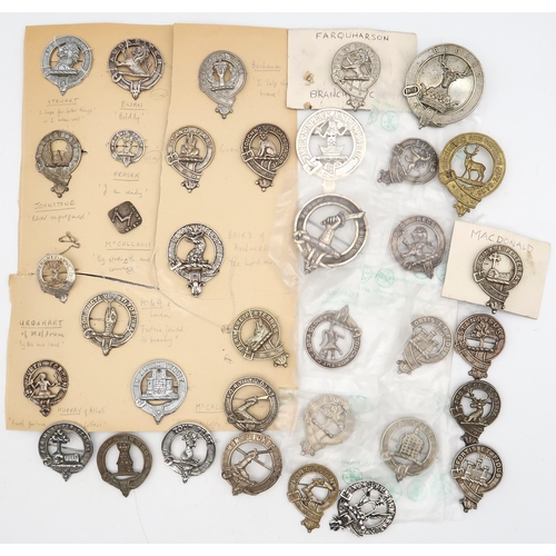 582 - A collection of Scottish clan badges, to include an Edinburgh silver Moffat example; others includin... 