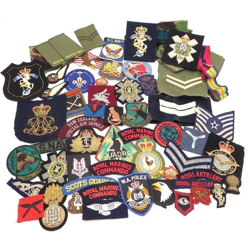 585 - Assorted military cloth patches, with a number of bullion-embroidered examples, including the Royal ... 