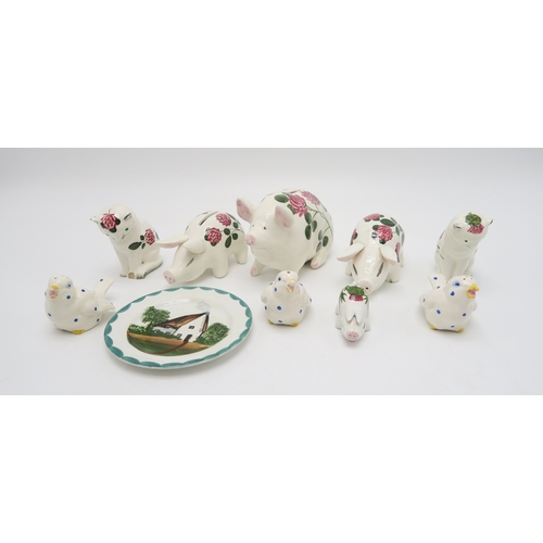 2244 - A GROUP OF PLICHTA ANIMALS AND BIRDSincluding three clover painted pigs, two being money boxes, a sm... 