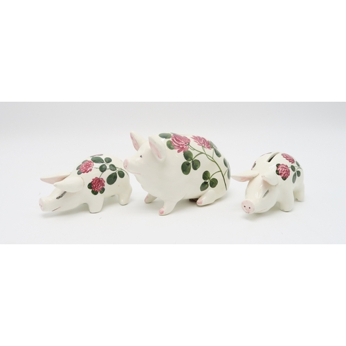 2244 - A GROUP OF PLICHTA ANIMALS AND BIRDSincluding three clover painted pigs, two being money boxes, a sm... 