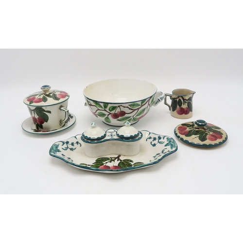 2246 - A COLLECTION OF WEMYSS WARE CHERRY PAINTED POTTERYincluding a two handled bowl, a chocolate cup and ... 