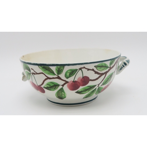 2246 - A COLLECTION OF WEMYSS WARE CHERRY PAINTED POTTERYincluding a two handled bowl, a chocolate cup and ... 