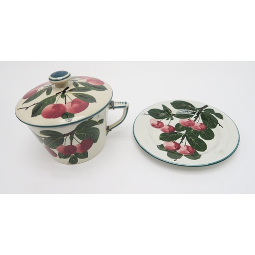 2246 - A COLLECTION OF WEMYSS WARE CHERRY PAINTED POTTERYincluding a two handled bowl, a chocolate cup and ... 