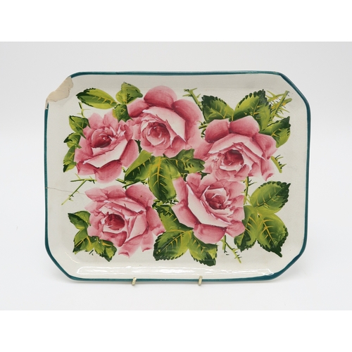 2250 - A SMALL GROUP OF WEMYSS WAREall painted with cabbage roses including a dog bowl, a tray, 26cm x 21cm... 