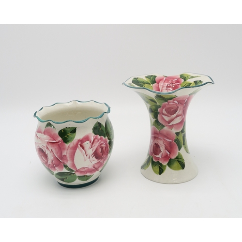 2250 - A SMALL GROUP OF WEMYSS WAREall painted with cabbage roses including a dog bowl, a tray, 26cm x 21cm... 