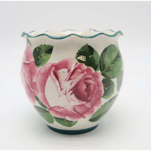 2250 - A SMALL GROUP OF WEMYSS WAREall painted with cabbage roses including a dog bowl, a tray, 26cm x 21cm... 