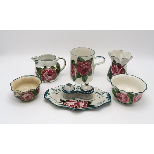 2253 - A COLLECTION OF WEMYSS WARE all painted with cabbage roses including a tankard 14cm high, a wavy rim... 