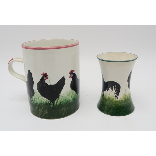 2258 - A COLLECTION OF WEMYSS WAREin Black cockerel and hens pattern including a large tankard, 14cm high, ... 