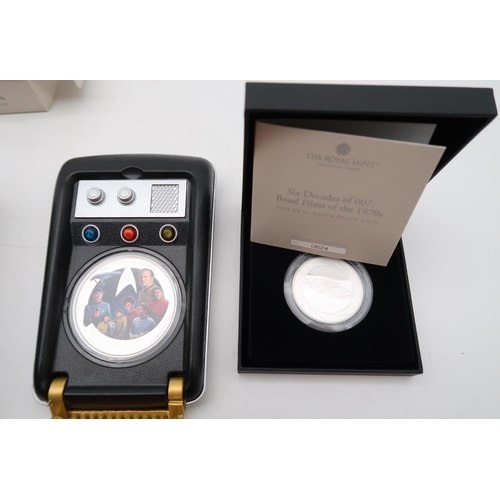 299 - STAR TREK a silver proof coin presented in a Star Trek Communicator certificate number 3428 together... 