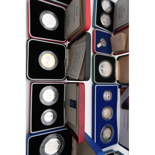 460 - Elizabeth II (1952-2022)A lot comprising The Silver Proof Piedfort Three Coin Collection 2004,&... 