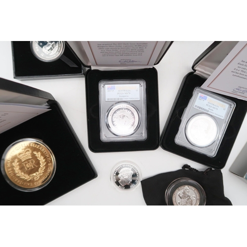 473 - Danbury Mint The World's Uncirculated Pure Silver Coins in collector's cabinet (8) together with var... 