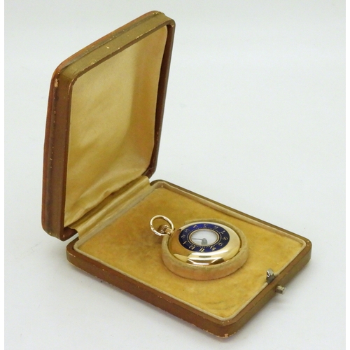 2911 - A LADIES HALF HUNTER FOB WATCHin 12ct gold with blue and gold enamelled chapter ring to the outer ca... 