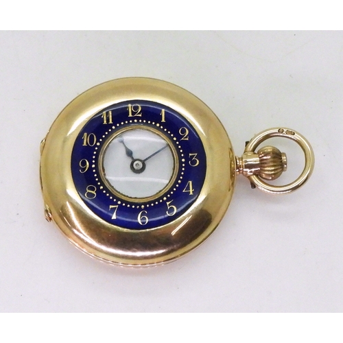 2911 - A LADIES HALF HUNTER FOB WATCHin 12ct gold with blue and gold enamelled chapter ring to the outer ca... 