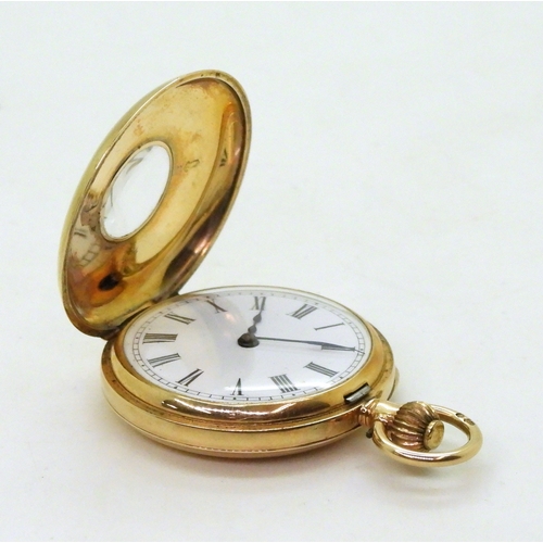 2911 - A LADIES HALF HUNTER FOB WATCHin 12ct gold with blue and gold enamelled chapter ring to the outer ca... 