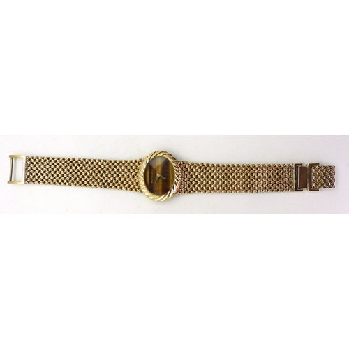 2914 - A BUECHE GIROD COCKTAIL WATCHmounted in 9ct gold with a herringbone patterned mesh strap and fluted ... 