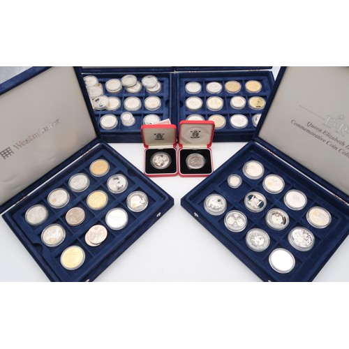 348 - ELIZABETH II A lot comprising 60 assorted silver proof coins in four collectors cases... 