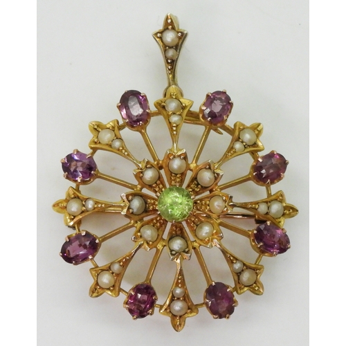 2775 - A SUFFRAGETTE PENDANT BROOCHmade in bright yellow metal and set with peridot, garnet and pearls, the... 