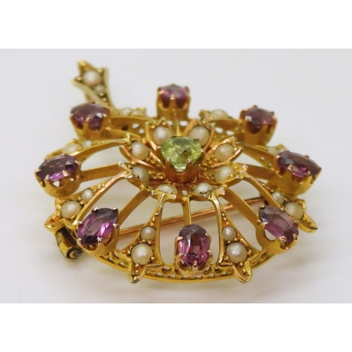 2775 - A SUFFRAGETTE PENDANT BROOCHmade in bright yellow metal and set with peridot, garnet and pearls, the... 