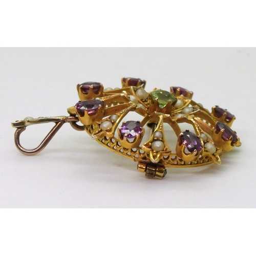 2775 - A SUFFRAGETTE PENDANT BROOCHmade in bright yellow metal and set with peridot, garnet and pearls, the... 