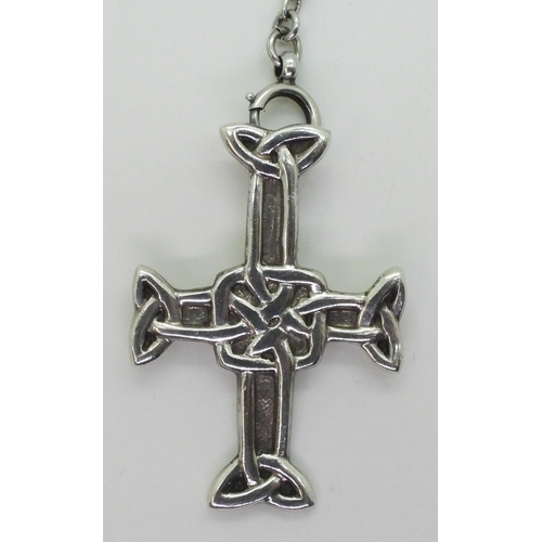 2777 - AN ALEXANDER RITCHIE JEWELthe white metal Celtic cross is suspended on a vine pattern long chain. th... 