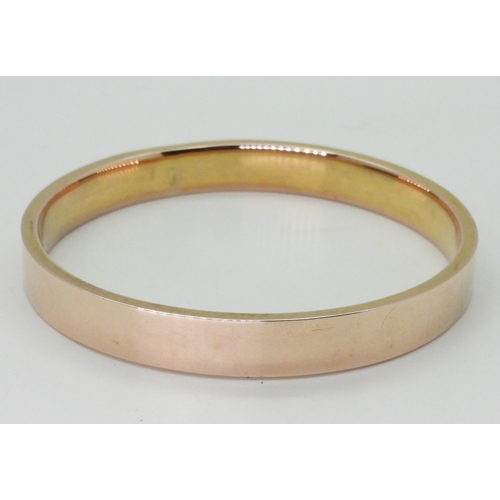 2780 - A 9CT GOLD UPPER ARM BANGLEhallmarked Chester 1922, inner diameter 7.4cm, weight 16.3gms... 