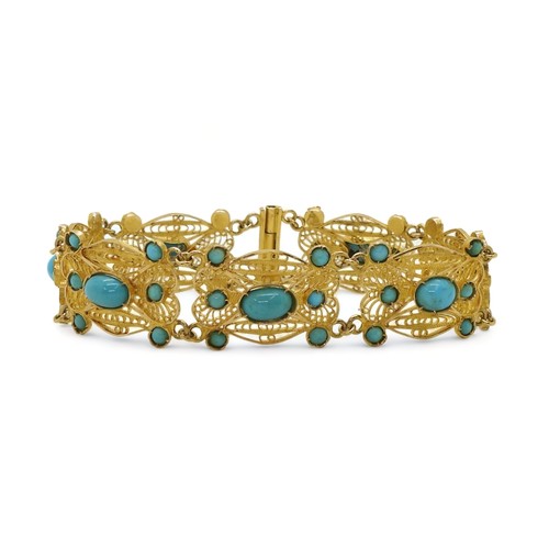 2701 - A FILIGREE AND TURQUOISE BRACELETmade in bright yellow metal stamped with Arabic marks verso and 750... 