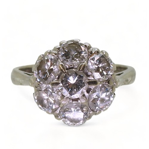 2704 - A DIAMOND FLOWER RINGthe classic mount in 18ct white gold is set with estimated approx 1.75cts of br... 