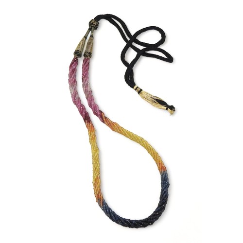 2712 - RAINBOW SAPPHIRE BEADSeach faceted bead is strung in a multi string twisted necklace with traditiona... 