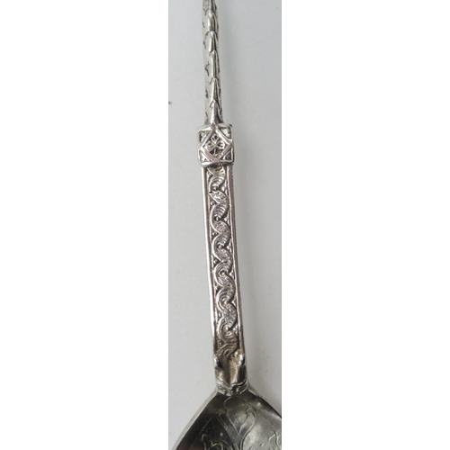 2510 - ALEXANDER RITCHIE; An Iona silver spoon, the petal-shaped bowl with floral decoration, the term... 