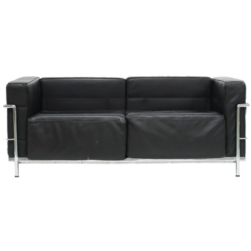 2101 - A 20TH CENTURY AFTER LE CORBUSIER TWO SEATER SETTEE with black leather cushions on chromed tubu... 