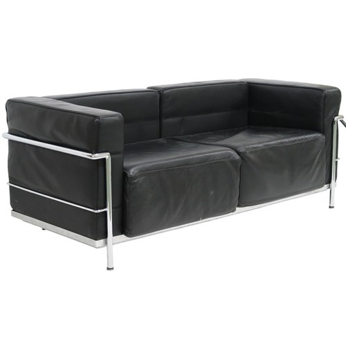 2101 - A 20TH CENTURY AFTER LE CORBUSIER TWO SEATER SETTEE with black leather cushions on chromed tubu... 