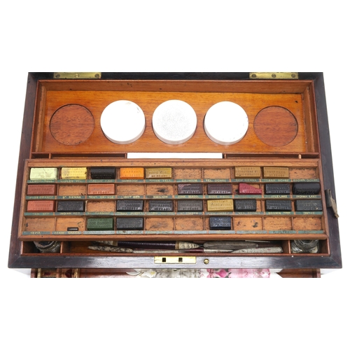 2614 - A VICTORIAN BRASS-BOUND ROSEWOOD ARTIST'S PAINT BOX BY REEVES AND SONS, LONDONContaining an array of... 