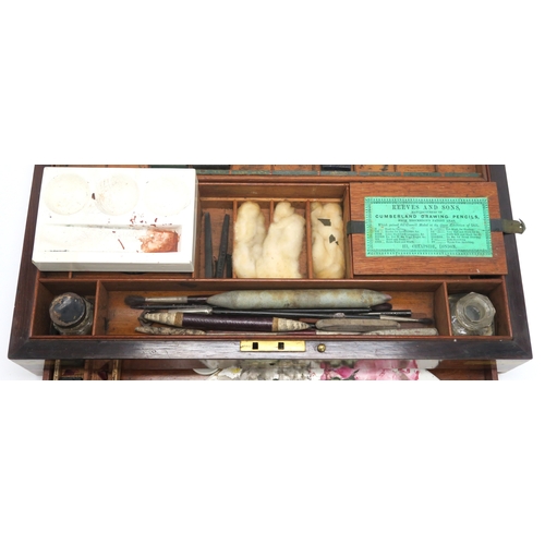 2614 - A VICTORIAN BRASS-BOUND ROSEWOOD ARTIST'S PAINT BOX BY REEVES AND SONS, LONDONContaining an array of... 