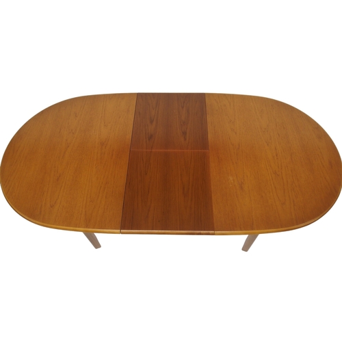 2096 - A 20TH CENTURY TEAK MEREDEW EXTENDING DINING TABLE AND SIX CHAIRS dining table with oval top co... 