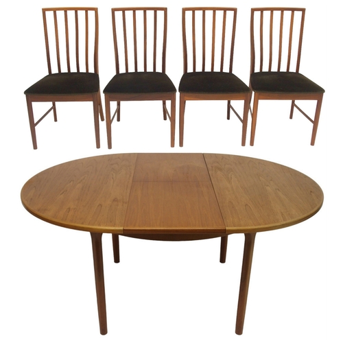 2104 - A MID 20TH CENTURY TEAK MCINTOSH CIRCULAR EXTENDING DINING TABLE AND FOUR CHAIRS dining table w... 