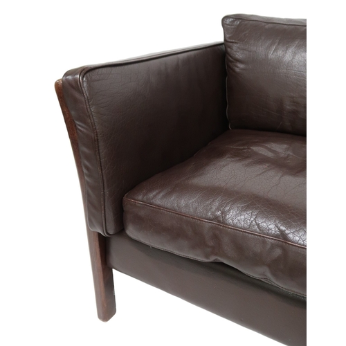 2106 - A 20TH CENTURY DANISH BROWN LEATHER UPHOLSTERED STOUBY THREE SEATER SETTEE with stained teak and lea... 